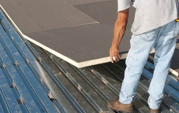 benefits of insulating Crosscanonby flat roofing